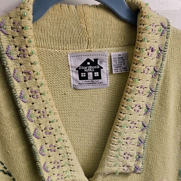 Storybook Knits Pastel Green Cardigan with Lavender Details - Picture 1 of 4